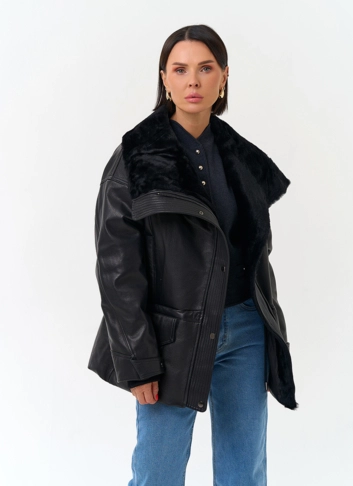 Женский пуховик из натуральной кожи фото